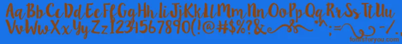 Lillybelle Font – Brown Fonts on Blue Background