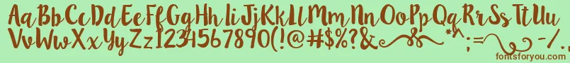 Lillybelle-Schriftart – Braune Schriften auf grünem Hintergrund