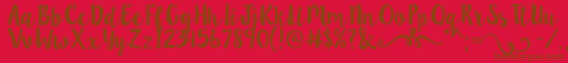 フォントLillybelle – 赤い背景に茶色の文字