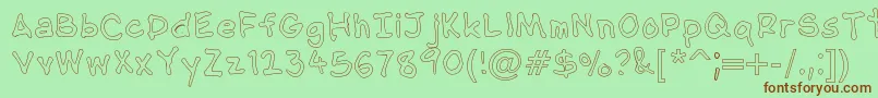 NipcensHandwritingOutline-fontti – ruskeat fontit vihreällä taustalla