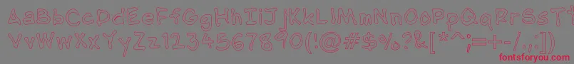 フォントNipcensHandwritingOutline – 赤い文字の灰色の背景