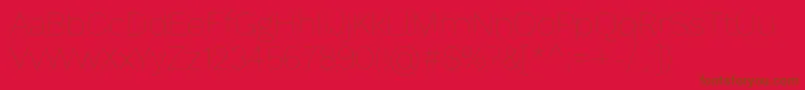 WorksansHairline-Schriftart – Braune Schriften auf rotem Hintergrund