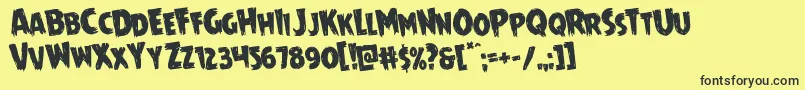 Mrsmonsterrotate Font – Black Fonts on Yellow Background