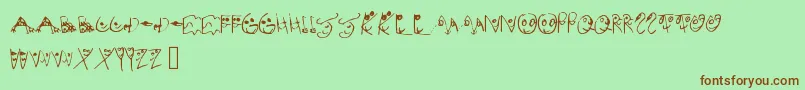 MelsionsSon-Schriftart – Braune Schriften auf grünem Hintergrund