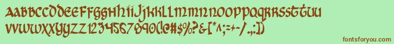 CryUncialCondensed Font – Brown Fonts on Green Background