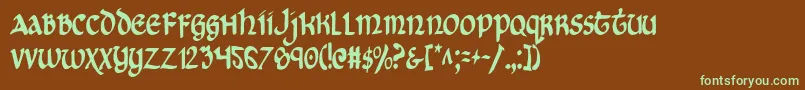 フォントCryUncialCondensed – 緑色の文字が茶色の背景にあります。