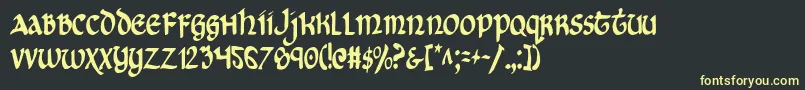 フォントCryUncialCondensed – 黒い背景に黄色の文字