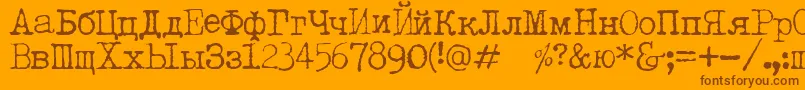 Czcionka LetteratrentadueTranslit – brązowe czcionki na pomarańczowym tle