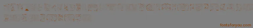 SpiritOfMontezuma Font – Brown Fonts on Gray Background