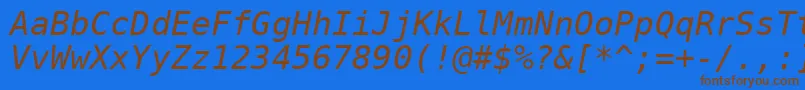 フォントDejavusansmono Oblique – 茶色の文字が青い背景にあります。