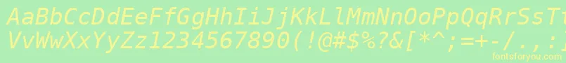 フォントDejavusansmono Oblique – 黄色の文字が緑の背景にあります