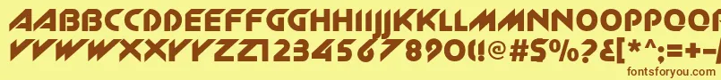 フォントNewzelekc – 茶色の文字が黄色の背景にあります。