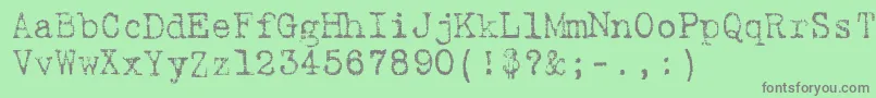 フォント9fukolym – 緑の背景に灰色の文字