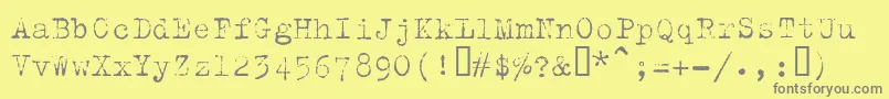 フォントTrixielight – 黄色の背景に灰色の文字