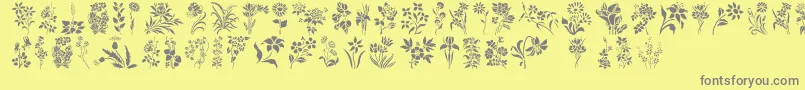 HffFloralStencil-fontti – harmaat kirjasimet keltaisella taustalla