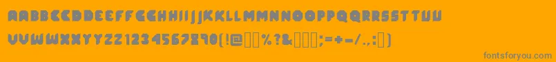 フォントZuperSkew – オレンジの背景に灰色の文字