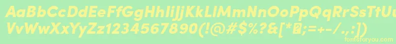 SofiaProBlackItalic-fontti – keltaiset fontit vihreällä taustalla
