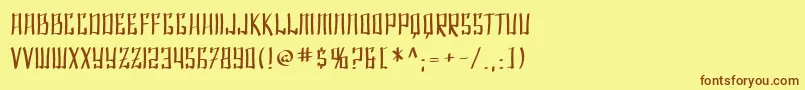 フォントSfShaiFontai – 茶色の文字が黄色の背景にあります。