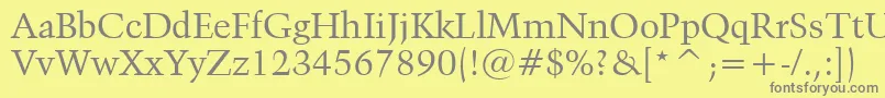 Kuenstler480Bt Font – Gray Fonts on Yellow Background