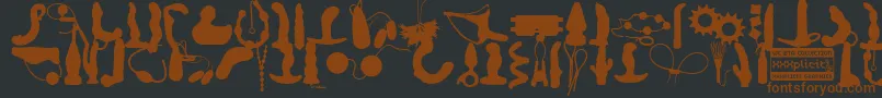 WcXxxplicitBta Font – Brown Fonts on Black Background