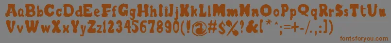 フォントBlurrrLetters – 茶色の文字が灰色の背景にあります。