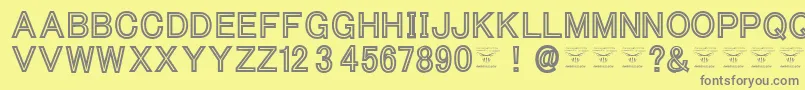 ThacoolkidzBlack Font – Gray Fonts on Yellow Background