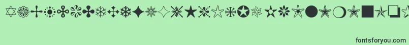 フォントMonotypeSorts – 緑の背景に黒い文字