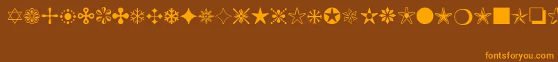 MonotypeSorts Font – Orange Fonts on Brown Background
