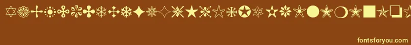 MonotypeSorts Font – Yellow Fonts on Brown Background