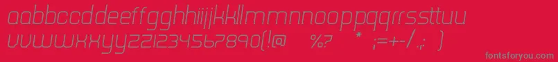 Police TripserifceLightitalic – polices grises sur fond rouge