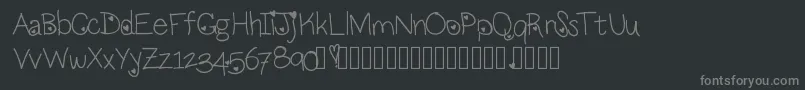 フォントLoveness – 黒い背景に灰色の文字