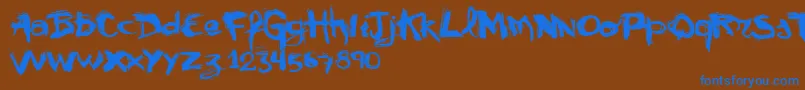 Czcionka Vtks Mural – niebieskie czcionki na brązowym tle