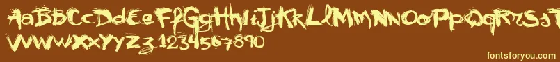 Vtks Mural Font – Yellow Fonts on Brown Background