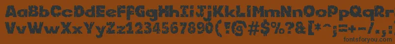 Kornik Font – Black Fonts on Brown Background