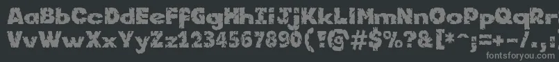 フォントKornik – 黒い背景に灰色の文字