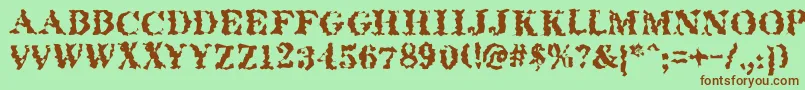 Quakeroman Font – Brown Fonts on Green Background