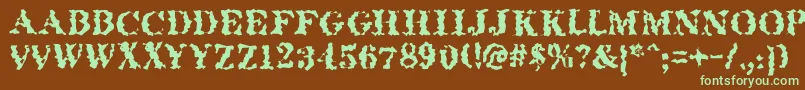 フォントQuakeroman – 緑色の文字が茶色の背景にあります。