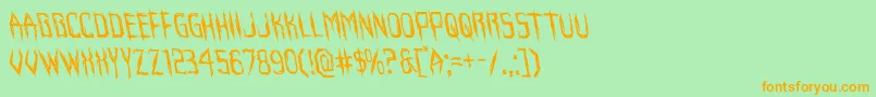 Horroroidleft-Schriftart – Orangefarbene Schriften auf grünem Hintergrund