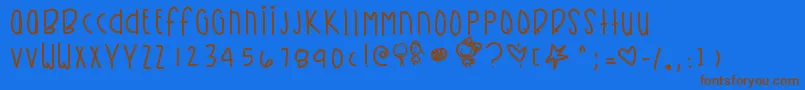 フォントKirbysdreamland – 茶色の文字が青い背景にあります。