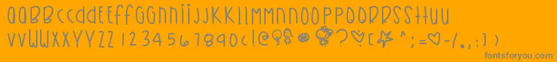 Fonte Kirbysdreamland – fontes cinzas em um fundo laranja