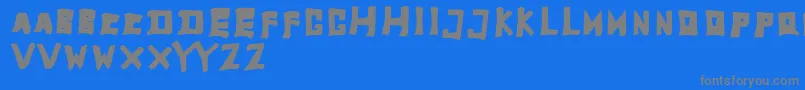 フォントTobyfontFull – 青い背景に灰色の文字