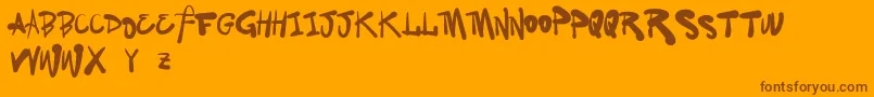 VtksFamily Font – Brown Fonts on Orange Background