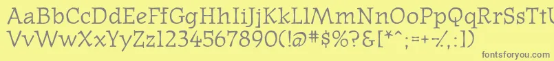 フォントWesternpressssk – 黄色の背景に灰色の文字