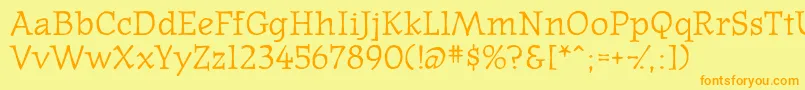 フォントWesternpressssk – オレンジの文字が黄色の背景にあります。