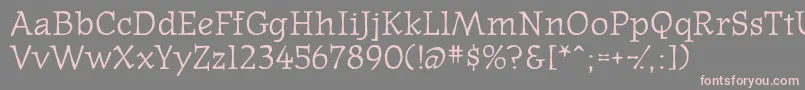 Westernpressssk-Schriftart – Rosa Schriften auf grauem Hintergrund