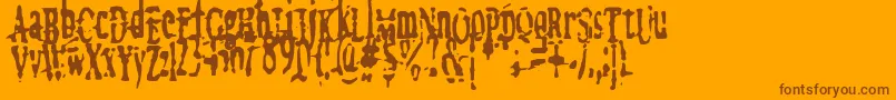 MegalomaniaX Font – Brown Fonts on Orange Background