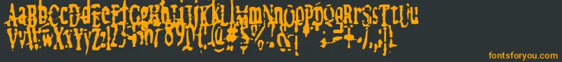 MegalomaniaX Font – Orange Fonts on Black Background