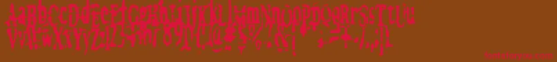 MegalomaniaX Font – Red Fonts on Brown Background
