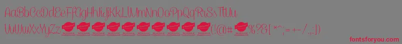 フォントCaneletterscriptthinPersonaluse – 赤い文字の灰色の背景