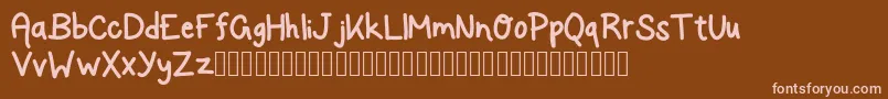 フォントRockSalmon – 茶色の背景にピンクのフォント